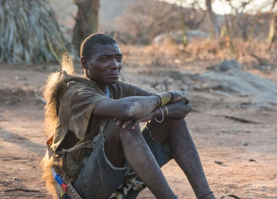 Portrait of elderly Hadzabe man in traditional clothing