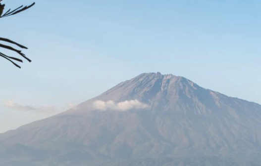 Mount Meru rising above clouds